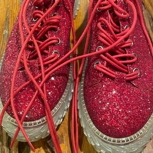 Get your groove on in these LIKE NEW ZANOTTI red crystal sneakers